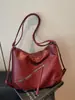 Bolsa de mano simple y moderna de invierno transfronteriza nueva 2025, bolsa de hombro de tela de material Pu, mochila de bolso de moda para mujer
