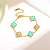 Pulsera de acero de titanio chapada en vacío 18k, diseño de nicho, trébol de cuatro hojas, floral, pulsera de moda de alta gama