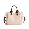 Bolso de mano elegante y versátil para mujer, nuevo diseño moderno 2026, adecuado para ir al trabajo, se puede llevar en la mano o usar como bolso de hombro o bolso cruzado