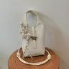 Bolso bandolera de piel suave con patrón de lichi, bolso de mano para mujer, sensación de alta gama, adecuado para el trabajo y los desplazamientos, bolso bandolera pequeño versátil para el teléfono