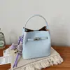 Bolso de Mano Sencillo Bolso Tote Pequeño para Mujer Primavera 2026 Nuevo Elegante Bolso Cubo para Viajes Diarios Bolso de Hombro Cruzado a la Moda