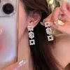 Pendientes de hija de chaebol pendientes para niñas diseño único de nicho atmósfera de alto nivel pendientes de temperamento sin agujero en la oreja