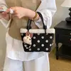 Bolso de mano vintage para mujer, nuevo y popular, de gamuza 2026, bolso cubo exquisito, bolso cruzado de lunares simple y de nicho, moderno