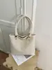 Bolso de mano tejido retro transfronterizo para mujer, nuevo modelo 2026, bolso de hombro o axila versátil de moda de alta gama para el día a día, moderno