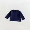 Nueva colección de otoño 2026: Camisetas térmicas para niños, camisetas de manga larga para niñas, ropa interior y exterior de color liso para bebés y niños pequeños, y camisetas para bebés niños