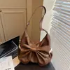Bolsa Retro de Gran Capacidad Transfronteriza Modelo Nuevo 2026 Versátil para Viajes Diarios Bolso de Hombro Cruzado para Mujer Bolso Tote con Lazo