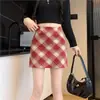 Falda de Lana a Cuadros Vintage para Mujer Otoño e Invierno Nueva Estilo Coreano Cintura Alta Falda Línea A Versátil Ajustada Cadera Falda Corta