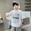 Camiseta de Verano para Niños Nueva Estampado de Letras Manga Corta Holgada Transpirable Niños Medianos y Grandes Marca de Moda Top Casual Ropa de Verano Camiseta de Moda T