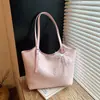 Bolsa tote de gran capacidad para mujer, nuevo modelo 2026, bolsa casual para el día a día, bolso de hombro versátil de nicho, mochila escolar para estudiantes