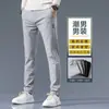 Calças compridas casuais masculinas novas calças de moletom high-end all-match outono calças de esportes de inverno largas forradas de lã