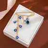 Broche de Borla Ojo del Diablo con Pedrería Creativa Europeo y Americano para Mujer, Pin de Estilo Vintage para Ceñir la Cintura de Suéter Ojo Azul de Alta Gama