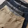 Pantalones vaqueros casuales rectos clásicos de algodón elástico lavado de alta gama con bolsillos rectos para hombre, otoño e invierno 2023, combinan con todo