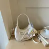 Bolso para mujer con diseño de nicho estilo coreano 2026 nueva moda primavera-verano bolso cruzado simple bolso de mano exquisito bolso tote pequeño