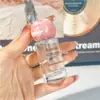 Botella dispensadora de perfume de alta gama 25 ml Botella de spray de vidrio 30 ml Botella de presión de nanorociado Botella vacía de repuesto portátil