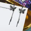 Corea del Sur pendientes largos elegantes súper Hada Mariposa borla mujer Mismo estilo de网红