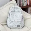 Mochila texturizada de cielo azul nublado con estrellas para estudiantes, que ofrece un ambiente de campus de ensueño, adecuada para clases, vacaciones y uso casual, bolsa versátil de doble hombro