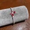 Pulseira de Luxo Leve Estilo Francês com Zircônia Gota d'Água Borboleta Exquisite Puxável com Design Único, Acessório de Mão Versátil e Elegante