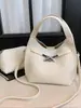 Bolso de Piel Rosa Suave de Alta Gama para Mujer 2026 Nuevo Estilo Bolso Cubo Bolso de Hombro Único Bolso Cruzado Versátil para Viajes al Trabajo Modelo de Diseño de Nicho