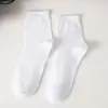 Calcetines de algodón para hombre, calcetines de caña media, otoño e invierno, negocios casual, algodón puro, primavera y otoño, calcetines para hombre, color liso, empaque individual, calcetines de algodón para cuatro estaciones