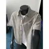 2026 Verão Novo Estilo Camisa de Manga Curta com Lapela Texturizada de Xadrez Casual Xadrez Retro Estilo College Camisa de Manga Curta