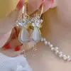 Pendientes de Flor de Lujo Ligero Imitación de Concha Francesa para Mujer Diseño de Nicho Elegantes de Gama Alta Pendientes Súper Hada de Pétalos