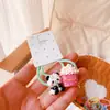 HD2112A025 Palomitas de Maíz Color Crema Lindo Panda Pequeño Moda Nicho Creativo Niñas Elástico Anillo para el Cabello de Niños Mujeres