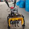 Nueva cortacésped diésel embrague tensor tracción en las cuatro ruedas autopropulsada micro-azada empuje manual máquina de zanjas de una rueda huerto de maíz