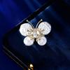 Accesorios de abrigo de otoño e invierno nicho temperamento cárdigan multiusos alfiler fijo para ropa broche de mariposa perla barroca
