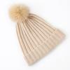 Fábrica otoño e invierno Nuevo adorno de bola de pelo de mapache coreano color liso gorro de cachemira de punto niños punto al por mayor