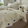 Conjunto de Quatro Peças Jacquard Tingido em Fio Lavado com Botões Coloridos Listrado Estilo Minimalista Novo Outono/Inverno 2026