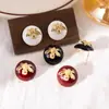 Pendientes Redondos Geométricos de Abeja Aguja Plateada Estilo Retro Francés Pendientes Sencillos Pendientes de Diseño Nicho Venta al por Mayor para Mujeres