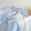 Nova Camisa Listrada Fresca Artística Solta de Outono e Primavera Manga Longa Oxford Branca e Azul Feminina