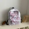Nueva bolsa deportiva casual de gran capacidad con graffiti estilo coreano, mochila moderna para hombres y mujeres, adecuada para estudiantes de secundaria y preparatoria