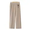 Pantalones rectos de cachemir sintético para otoño de madre 2026 otoño/invierno nuevos elegantes versátiles de lana de pierna ancha para mujeres de mediana edad