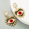 Aretes de moda transfronterizos de estilo europeo y americano, creativos, exquisitos, exagerados, con cuentas de diamantes de ojos de diablo, perlas y forma de corazón.