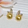 Aretes de nácar de concha de perla blanca australiana aretes de perla mariposa colgante de perla aretes gruesos de perla dorada venta al por mayor de perlas