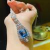 Livrinho Vermelho recomenda Joias Originais Imitação Topázio Azul Suíço Pingente Seiko Incrustado Colar de Diamantes de Alto Carbono