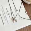 Collar de amor estilo frío de Corea del Sur, sencillo, combinable con todo, para otoño e invierno, cadena de lana, nicho ligero, lujoso, de alta gama, collar retro para mujer