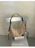 Bolso de ante para axila de mujer, nuevo bolso de hombro vintage para el trabajo de otoño 2026, bolso tote plisado de alta gama