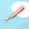 Llavero de cuero, colgante de aleación de cuero sintético, decoración de PU para teléfono móvil de pareja