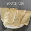 Bolsa de mano de alta gama para tienda de ropa de mujer, bolsa de regalo de embalaje tejida, bolsa de embalaje para compras, se puede imprimir con logo