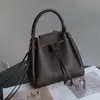 Bolsa Saco de Couro Bovino de Primeira Camada com Cordão Transfronteiriça Togo para Mulheres 2026 Nova Bolsa de Mão Versátil de Couro Genuíno de Grande Capacidade
