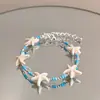 Pulsera de Concha y Caracola Estilo Resort Costero Nuevo Estilo con Cuentas Apiladas, Alto Valor Estético, Versátil, Joyería Femenina Suave y Elegante