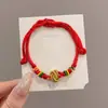 Pulseira de corda colorida zongzi do Festival do Barco-Dragão 2026 novo modelo pulseira trançada artesanal étnica infantil atacado corda vermelha