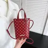Bolso de mano nuevo de lunares, bolso para teléfono estampado, bolso de nicho estilo coreano, bolso de hombro de moda para el día a día para niñas, bolso cruzado