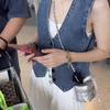 Moda coreana Casual de moda Chaleco de mezclilla Chaqueta para mujer Verano Estilo extranjero Moda Holgado Apilado Cuello en V Chaleco