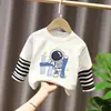 Camiseta de Manga Larga 100% Algodón para Niños Estilo Nuevo Primavera/Otoño 2026 Ropa Casual para Bebés y Niños Dibujos Animados Top Falso de Dos Piezas