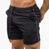 Amazon shorts de verão masculinos de secagem rápida cor sólida esportivos fitness calças de cinco pontos calças de praia fabricantes atacado