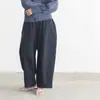 Pantalones cortos casuales lisos de estilo japonés y coreano transfronterizos para mujer, pantalones harén de moda vintage de otoño, pantalones de pierna ancha de ajuste holgado talla grande