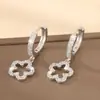 Pendientes de botón con colgante de pétalo de cobre con incrustaciones de circonita, estilo europeo y americano, temperamento de lujo, diseño de moda, pendientes Joker para mujer, venta al por mayor